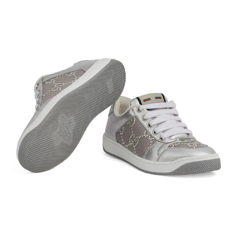 Gucci Silver Sneakers: A Versatile Style Staple ✨👟These Gucci silver sneakers are a true fashion statement. Their sleek design and shimmering finish make them a perfect addition to any wardrobe. But how can you style them to create different looks? Here are three outfit ideas:Casual ChicPair with: High-waisted jeans, a simple white tee, and a denim jacket.Why it works: This classic combination creates an effortlessly cool and casual look. The silver sneakers add glamour, while the denim jacket keeps things relaxed. Sporty SpicePair with: Black leggings, an oversized hoodie, and a baseball cap.Why it works: Channel your inner athlete with this sporty ensemble. The silver sneakers add a touch of sophistication to workout wear. 🏋️‍♀️Dressy CasualPair with: A floral midi dress and a leather jacket.Why it works: This unexpected combination is perfect for a night out. The sneakers balance the femininity of the dress and add an edge. #SilverSneakers #SneakerStyle #GucciSneakers #FashionVersatilitGucci Silver Sneakers: A Versatile Style Staple ✨👟These Gucci silver sneakers are a true fashion statement. Their sleek design and shimmering finish make them a perfect addition to any wardrobe. But how can you style them to create different looks? Here are three outfit ideas:Casual ChicPair with: High-waisted jeans, a simple white tee, and a denim jacket.Why it works: This classic combination creates an effortlessly cool and casual look. The silver sneakers add glamour, while the denim jacket keeps things relaxed. Sporty SpicePair with: Black leggings, an oversized hoodie, and a baseball cap.Why it works: Channel your inner athlete with this sporty ensemble. The silver sneakers add a touch of sophistication to workout wear. 🏋️‍♀️Dressy CasualPair with: A floral midi dress and a leather jacket.Why it works: This unexpected combination is perfect for a night out. The sneakers balance the femininity of the dress and add an edge. #SilverSneakers #SneakerStyle #GucciSneakers #FashionVersatilit