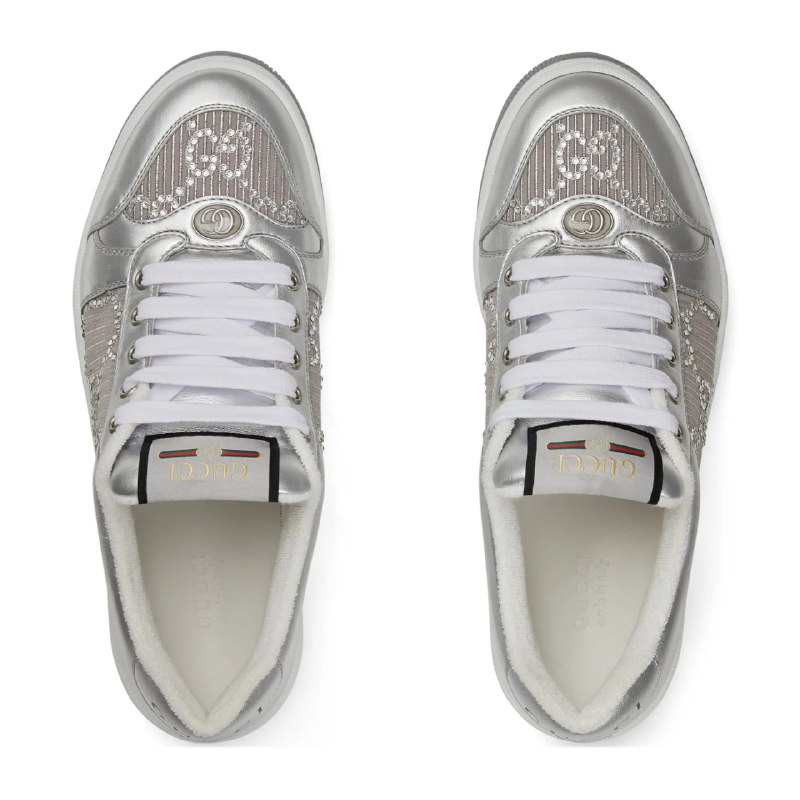 Gucci Silver Sneakers: A Versatile Style Staple ✨👟These Gucci silver sneakers are a true fashion statement. Their sleek design and shimmering finish make them a perfect addition to any wardrobe. But how can you style them to create different looks? Here are three outfit ideas:Casual ChicPair with: High-waisted jeans, a simple white tee, and a denim jacket.Why it works: This classic combination creates an effortlessly cool and casual look. The silver sneakers add glamour, while the denim jacket keeps things relaxed. Sporty SpicePair with: Black leggings, an oversized hoodie, and a baseball cap.Why it works: Channel your inner athlete with this sporty ensemble. The silver sneakers add a touch of sophistication to workout wear. 🏋️‍♀️Dressy CasualPair with: A floral midi dress and a leather jacket.Why it works: This unexpected combination is perfect for a night out. The sneakers balance the femininity of the dress and add an edge. #SilverSneakers #SneakerStyle #GucciSneakers #FashionVersatilitGucci Silver Sneakers: A Versatile Style Staple ✨👟These Gucci silver sneakers are a true fashion statement. Their sleek design and shimmering finish make them a perfect addition to any wardrobe. But how can you style them to create different looks? Here are three outfit ideas:Casual ChicPair with: High-waisted jeans, a simple white tee, and a denim jacket.Why it works: This classic combination creates an effortlessly cool and casual look. The silver sneakers add glamour, while the denim jacket keeps things relaxed. Sporty SpicePair with: Black leggings, an oversized hoodie, and a baseball cap.Why it works: Channel your inner athlete with this sporty ensemble. The silver sneakers add a touch of sophistication to workout wear. 🏋️‍♀️Dressy CasualPair with: A floral midi dress and a leather jacket.Why it works: This unexpected combination is perfect for a night out. The sneakers balance the femininity of the dress and add an edge. #SilverSneakers #SneakerStyle #GucciSneakers #FashionVersatilit